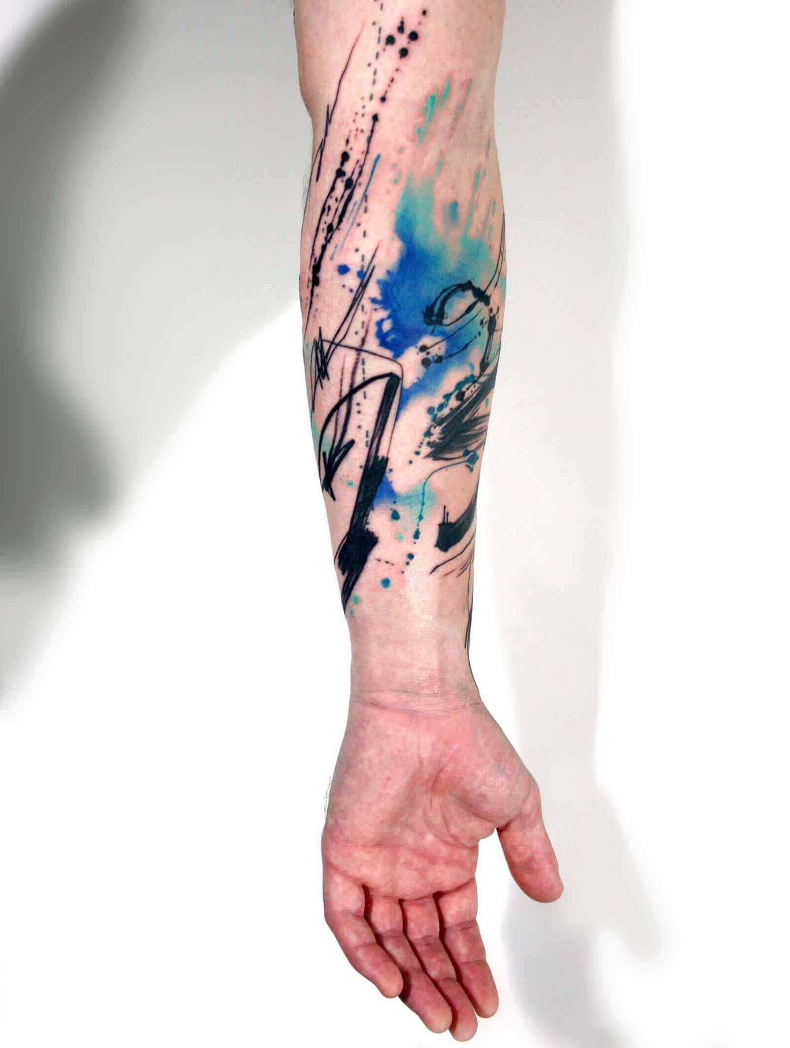 Abstract sleeve tattoo - Avantgarde Tattoo Barcelona