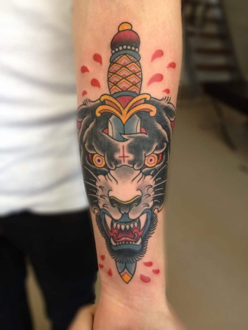 wolf and dagger tattoo