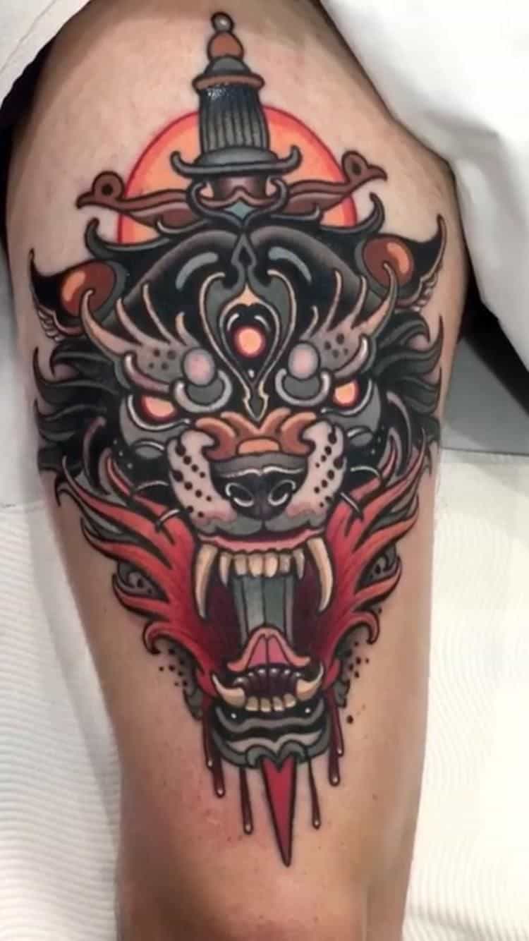 wolf and dagger tattoo