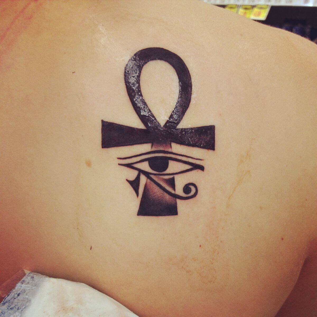 ankh tattoo on back