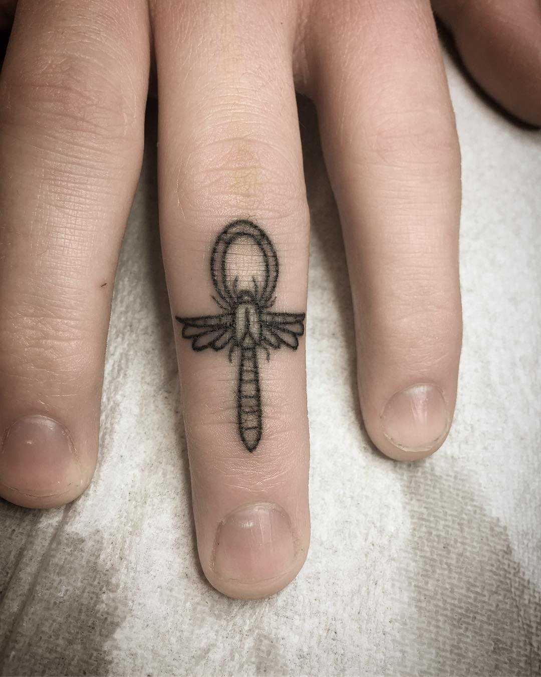 ankh tattoo on finger