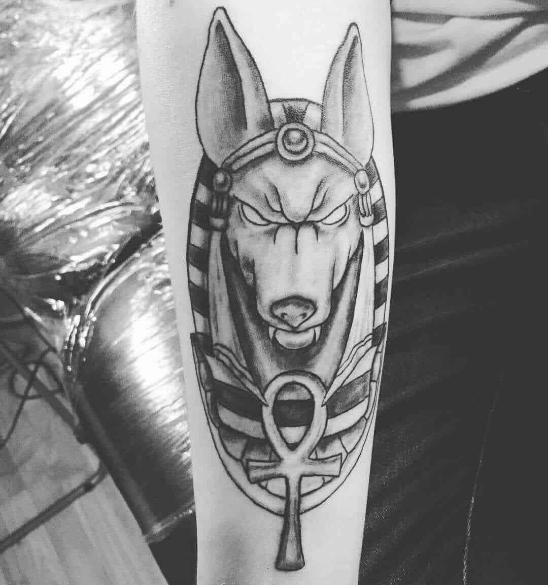 anubis head with ankh tattoo