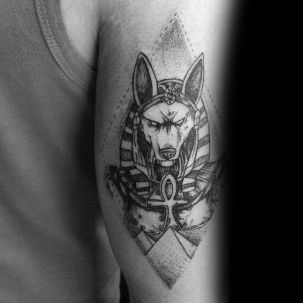 anubis head with ankh tattoo