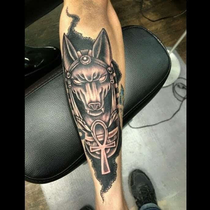 anubis head with ankh tattoo