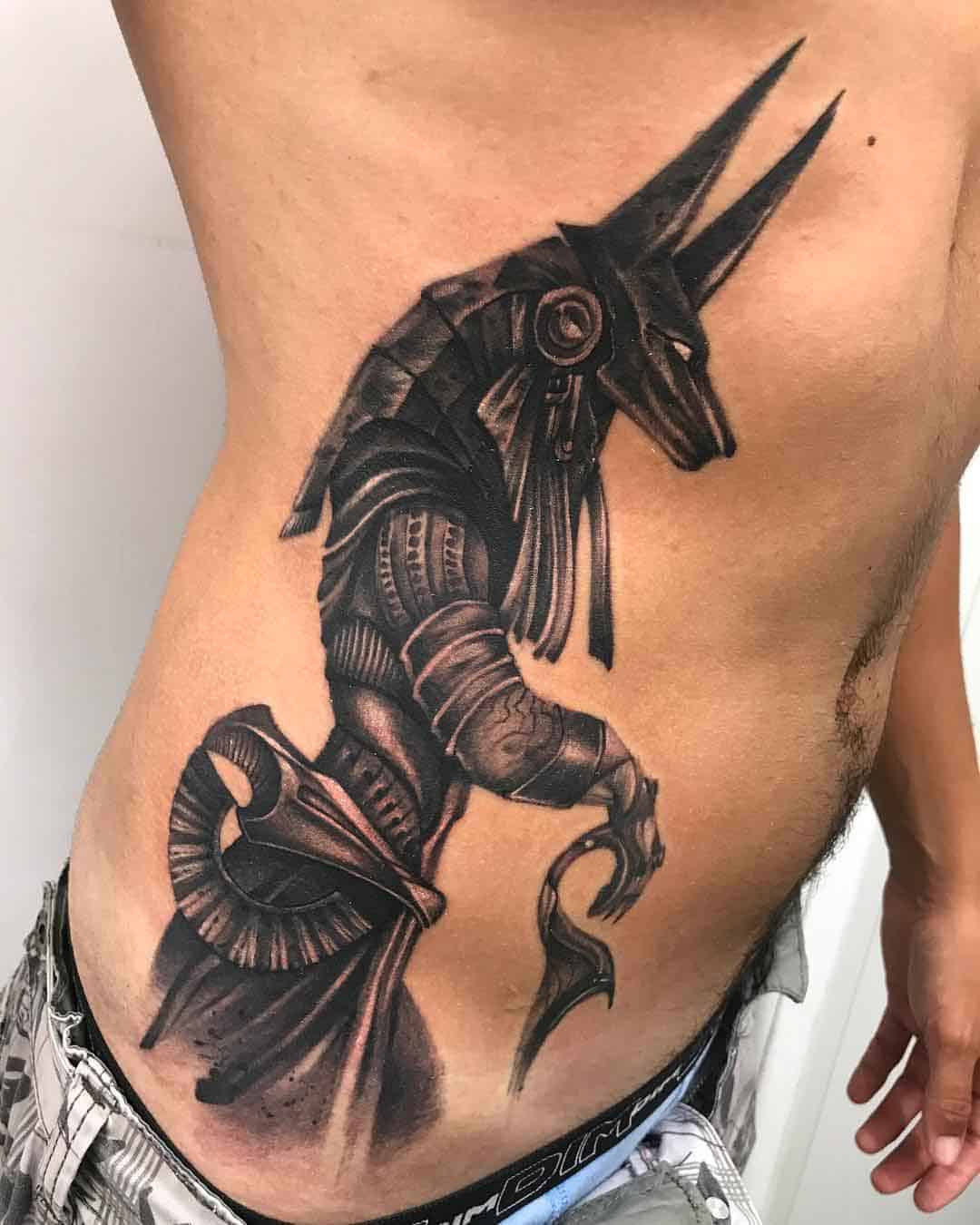 anubis tattoo on rib