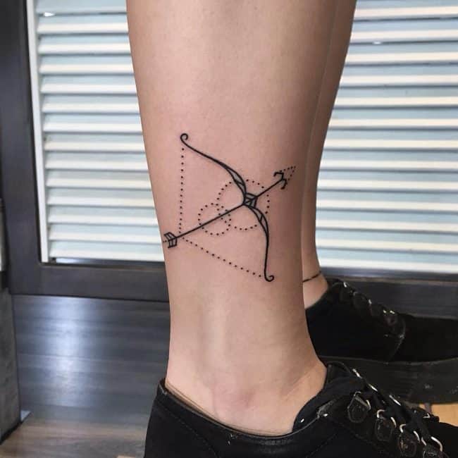 arrow sagittarius tattoo on ankle