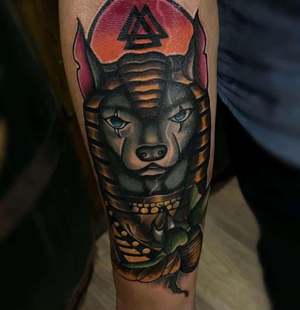 colored anubis tattoo