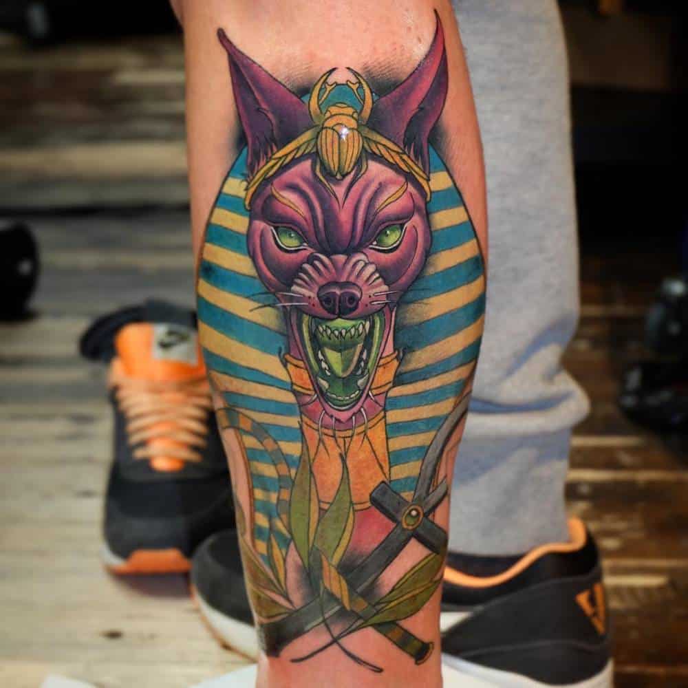 colored anubis tattoo