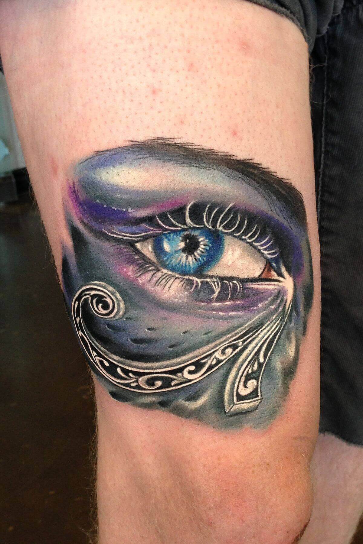 colored eye of horus tattoo