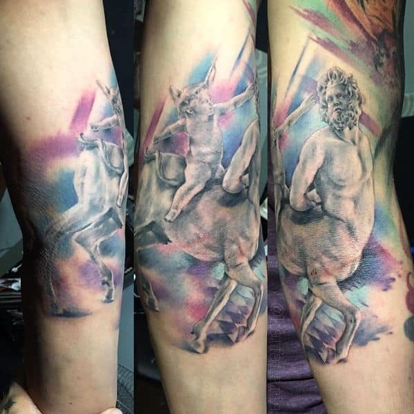 colored sagittarius tattoo on arm