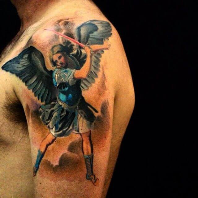 colored saint michael tattoo on arm