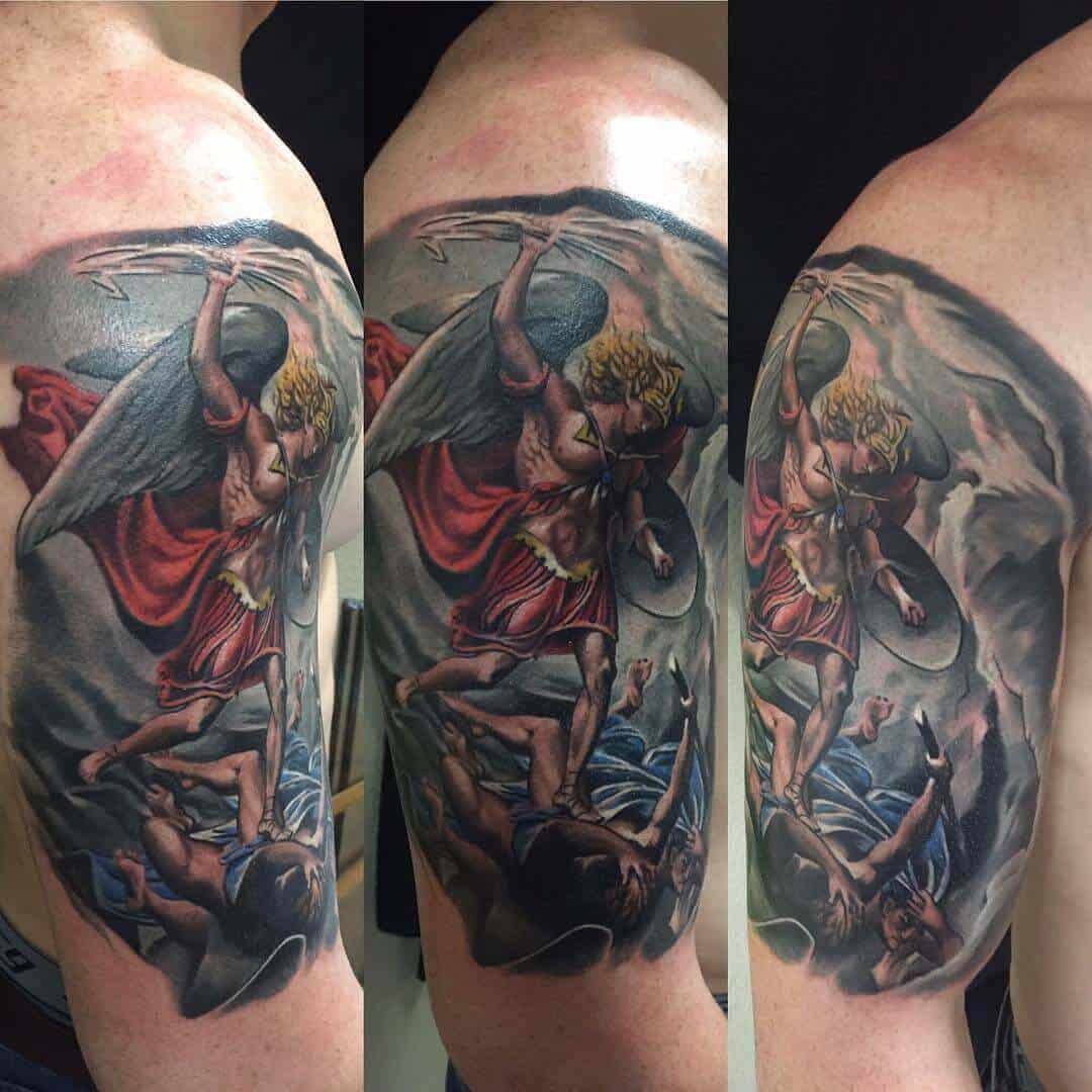 colored saint michael tattoo on arm