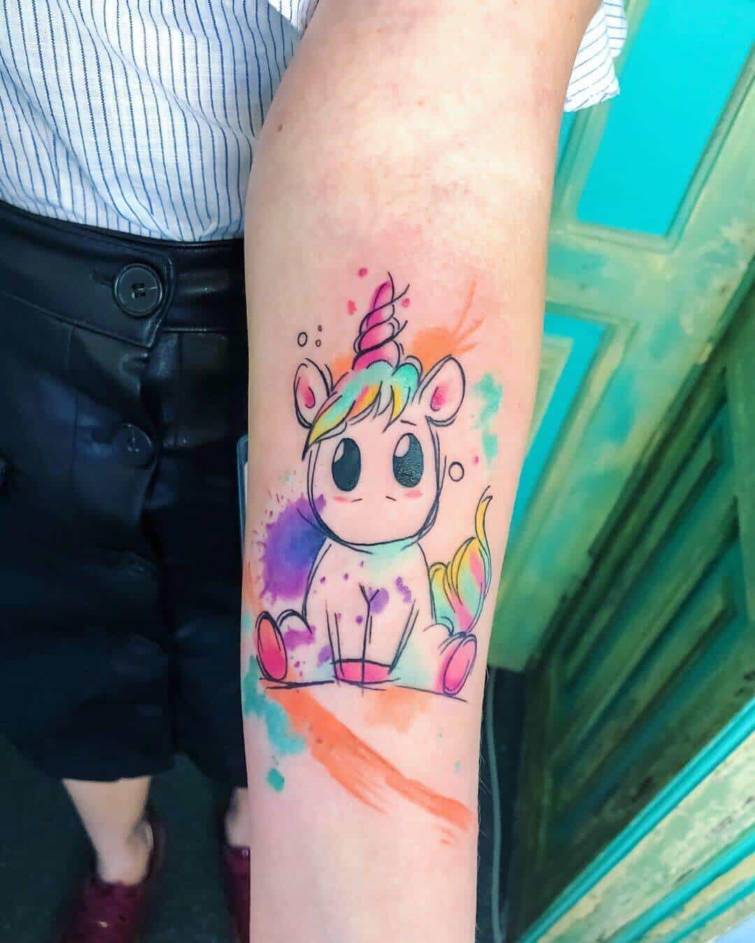 colorful unicorn tattoo on arm
