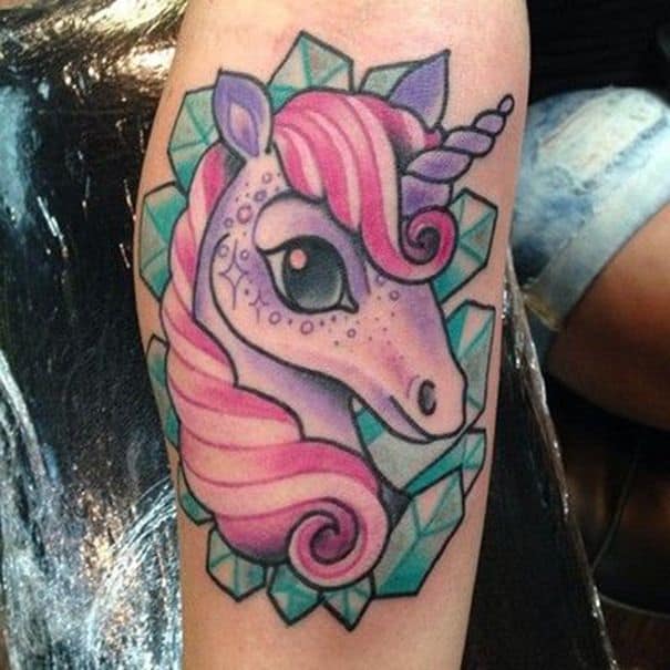 colorful unicorn tattoo on arm