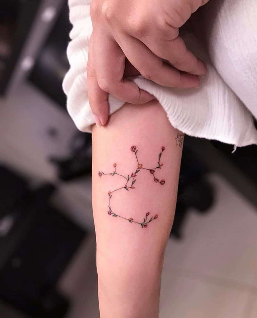 Geometric Arrow & Bow Sagittarius Tattoo Design - Astro Tattoos