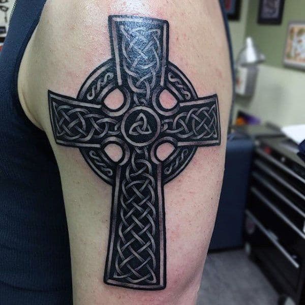 cross celtic tattoo on arm