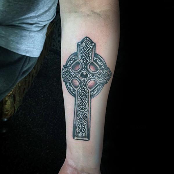 cross celtic tattoo on arm