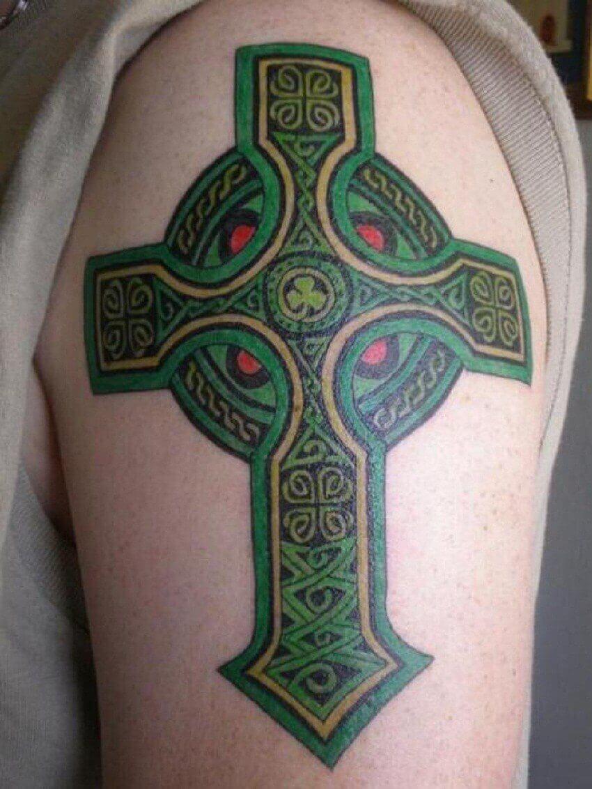 cross celtic tattoo on arm