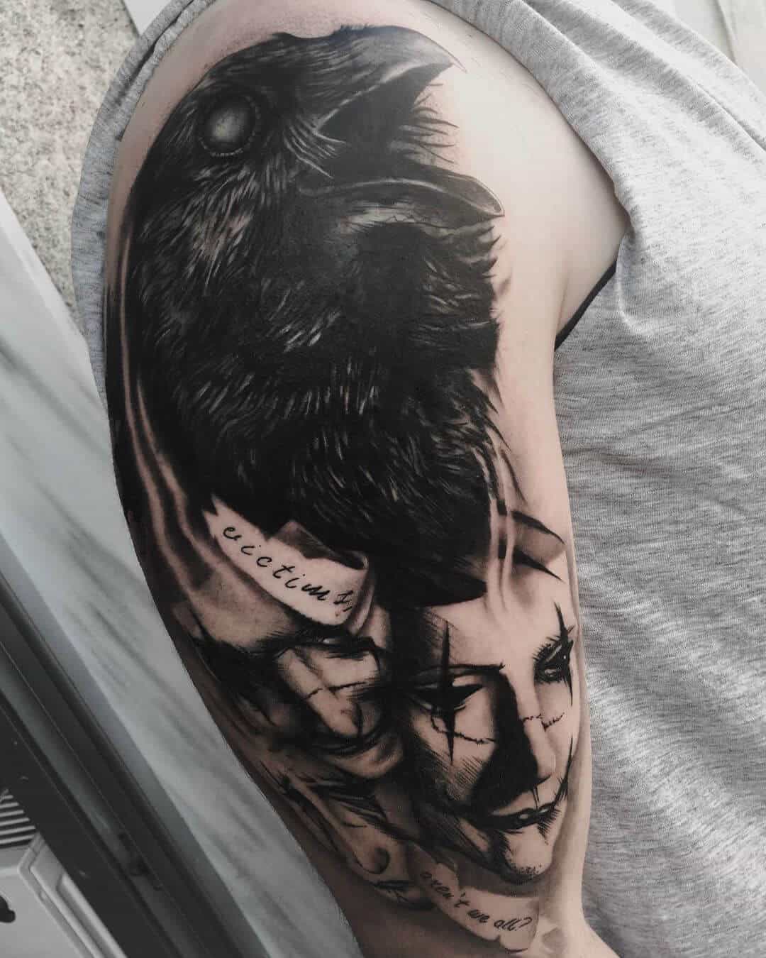 crow raven tattoo on arm