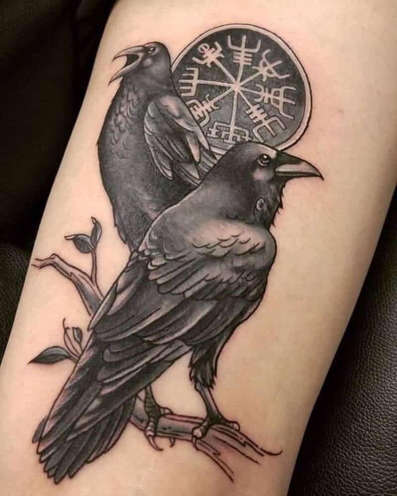 crow raven arm tattoo