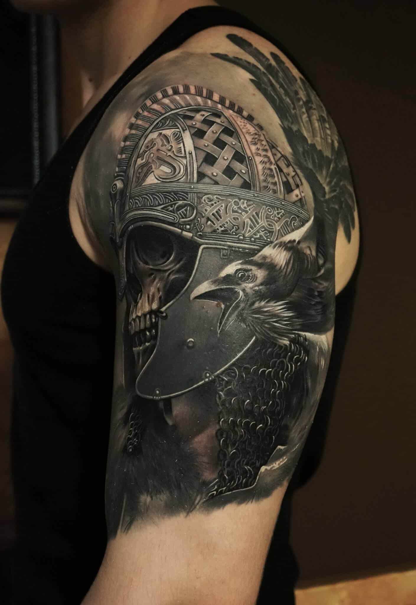 crow raven tattoo on arm