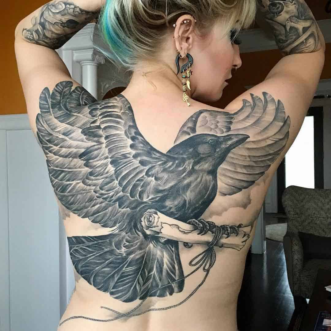 crow raven back tattoo