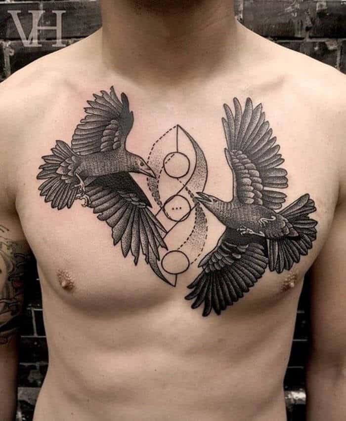 crow raven chest tattoo