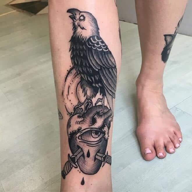 crow raven tattoo on leg
