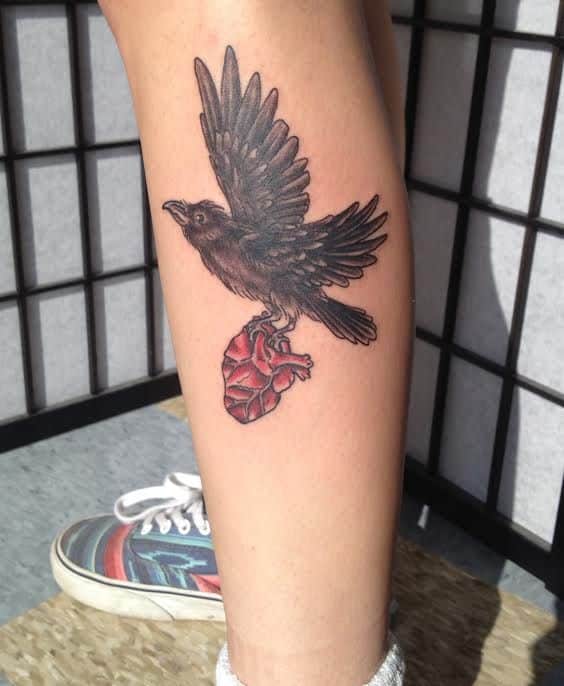 crow raven leg tattoo