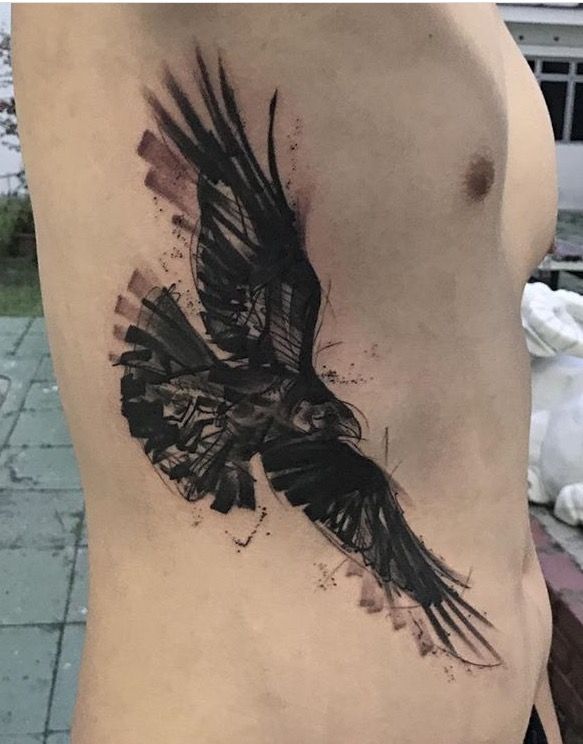crow raven rib tattoo