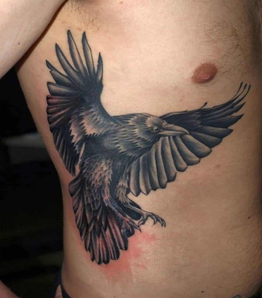 crow raven rib tattoo