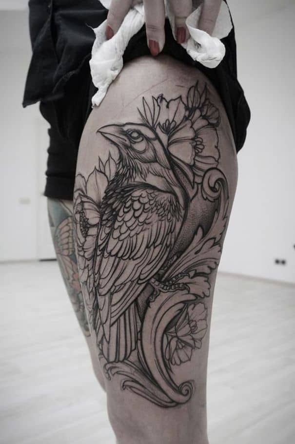 crow raven thigh tattoo