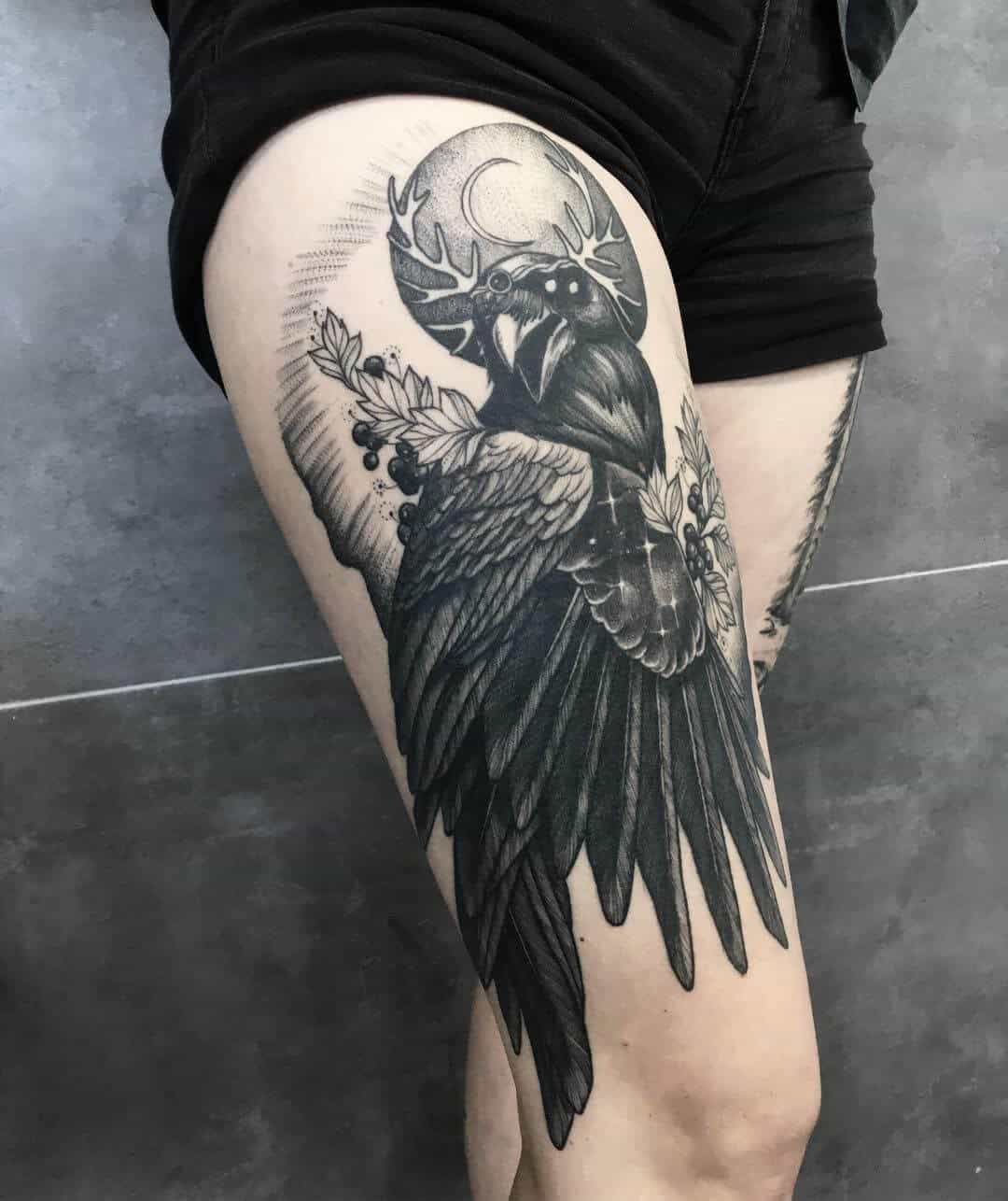 crow raven thigh tattoo