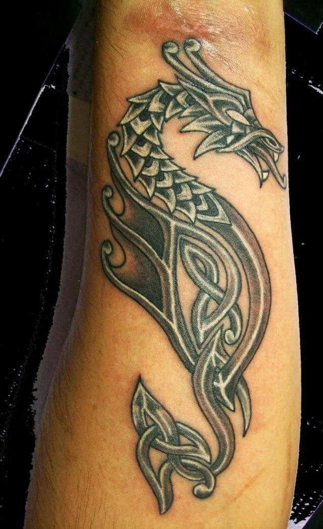 dragon celtic tattoo on arm