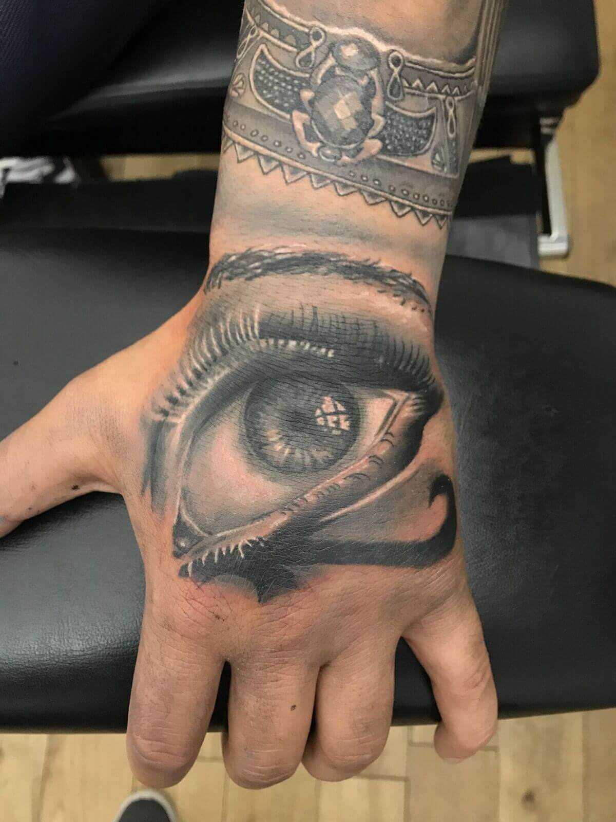 eye of horus hand tattoo