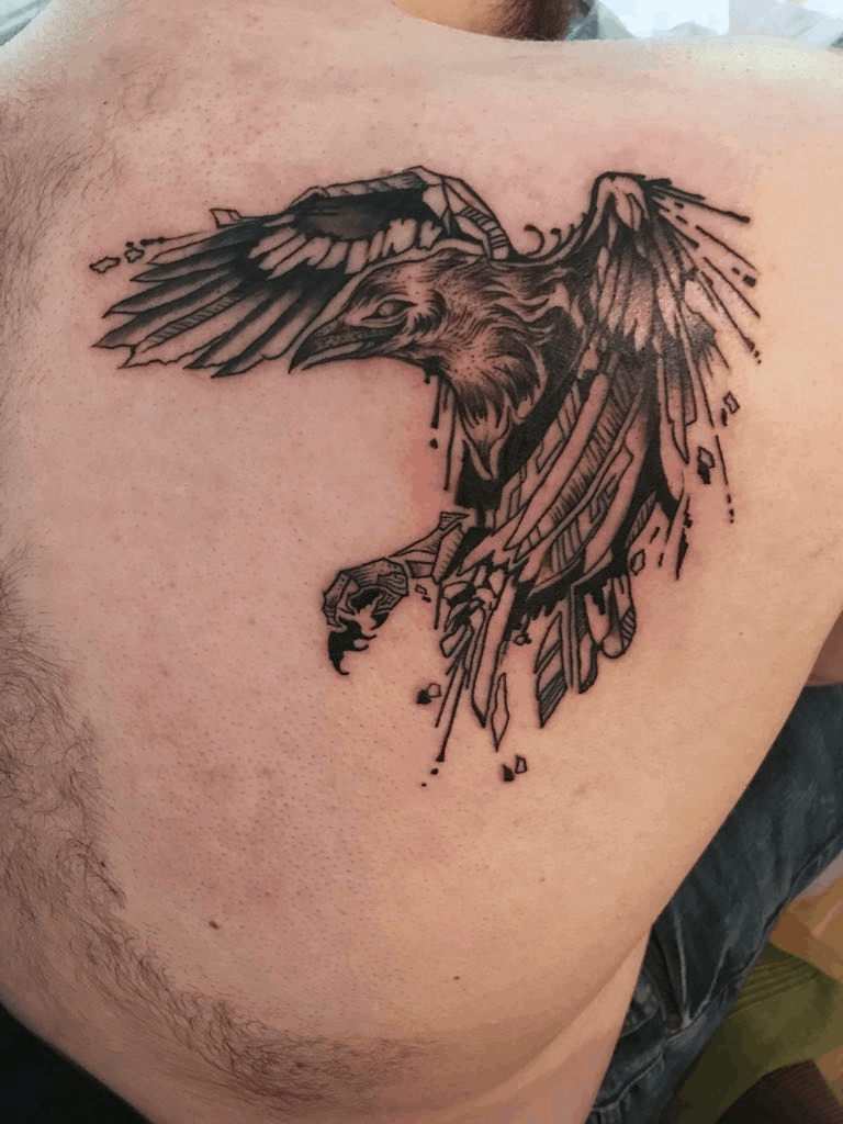 geometric crow raven tattoo