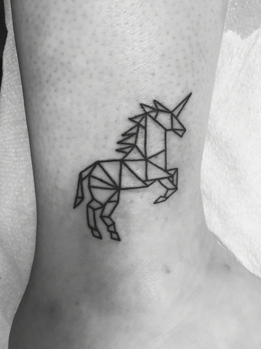 geometric unicorn tattoo on ankle