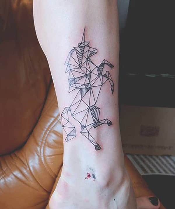 geometric unicorn tattoo