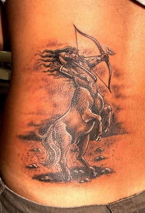 sagittarius rib tattoo