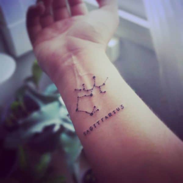 sagittarius tattoo on wrist