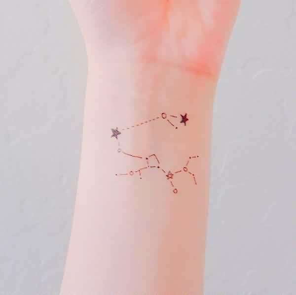 sagittarius tattoo on wrist