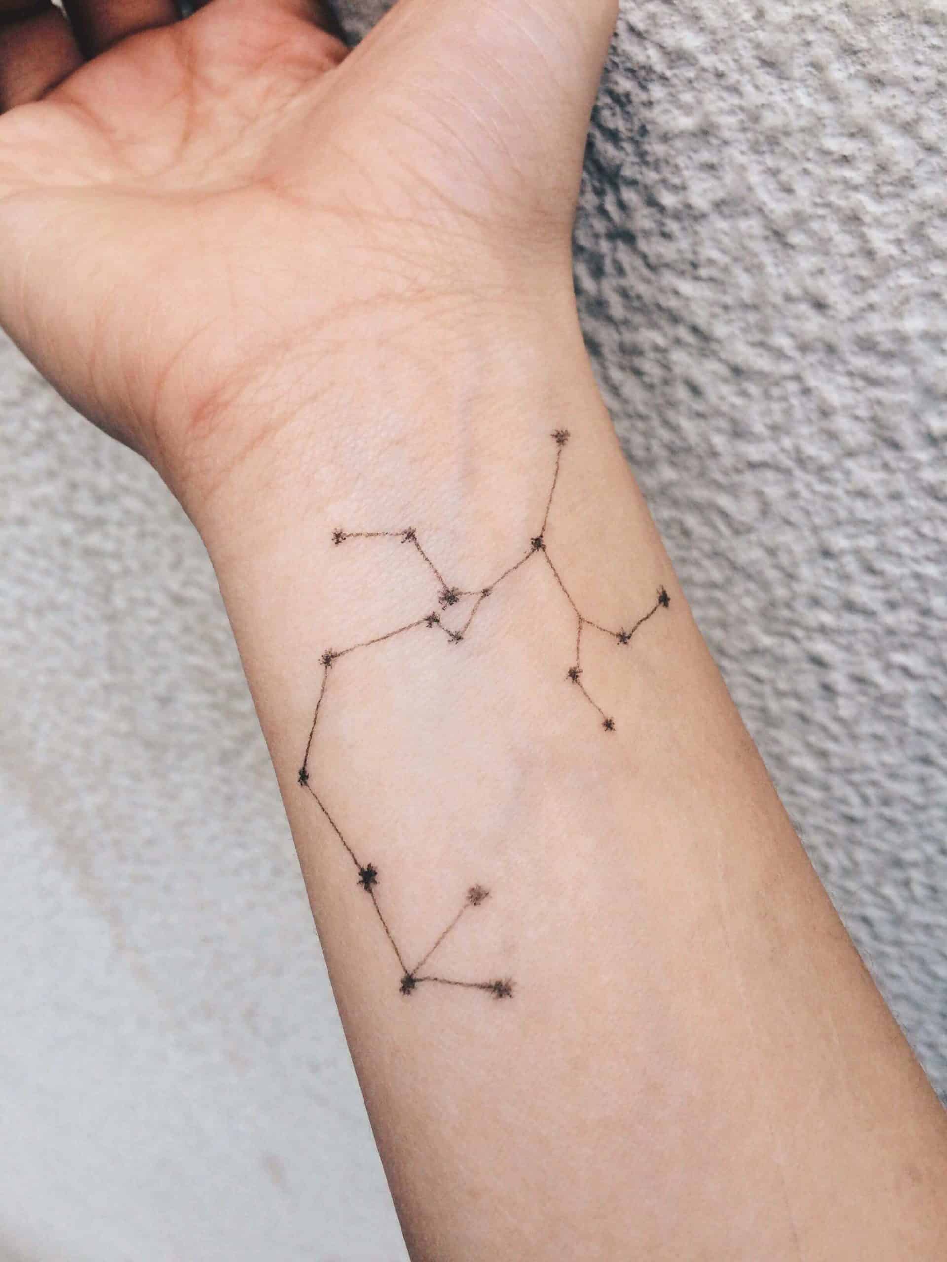 sagittarius tattoo on wrist