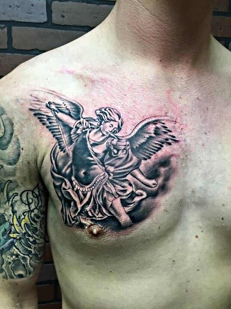 saint michael chest tattoo