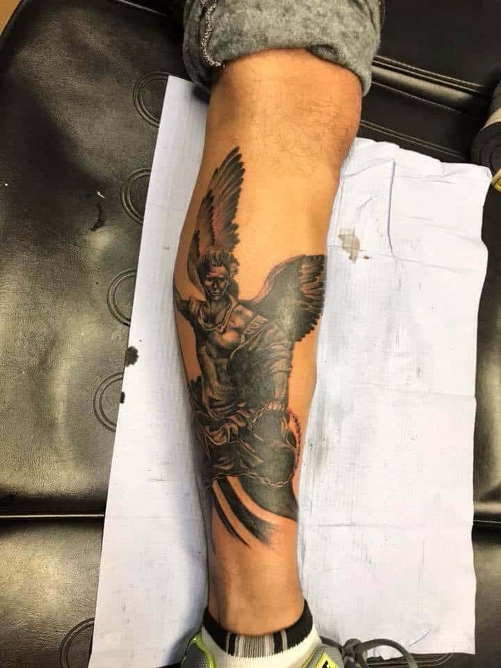 saint michael leg tattoo