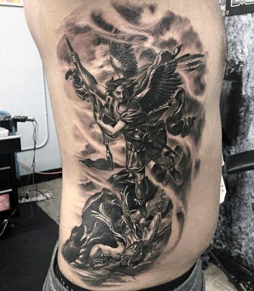 saint michael tattoo on rib