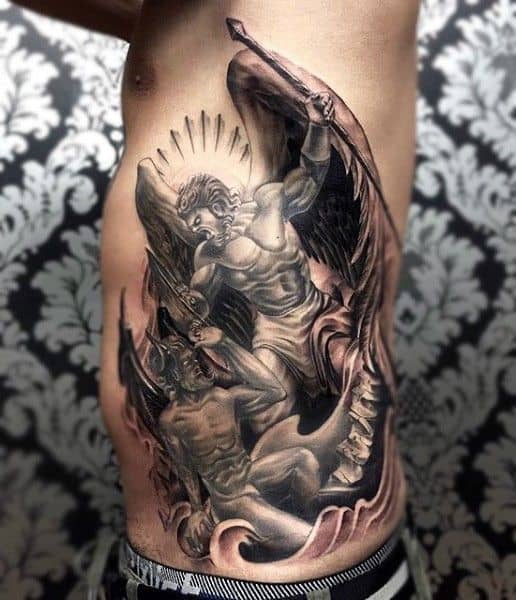 saint michael rib tattoo