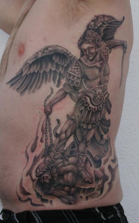 saint michael rib tattoo