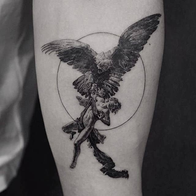 small saint michael tattoo on arm
