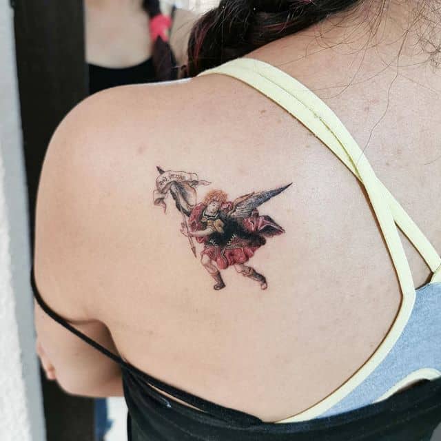 small saint michael tattoo on back