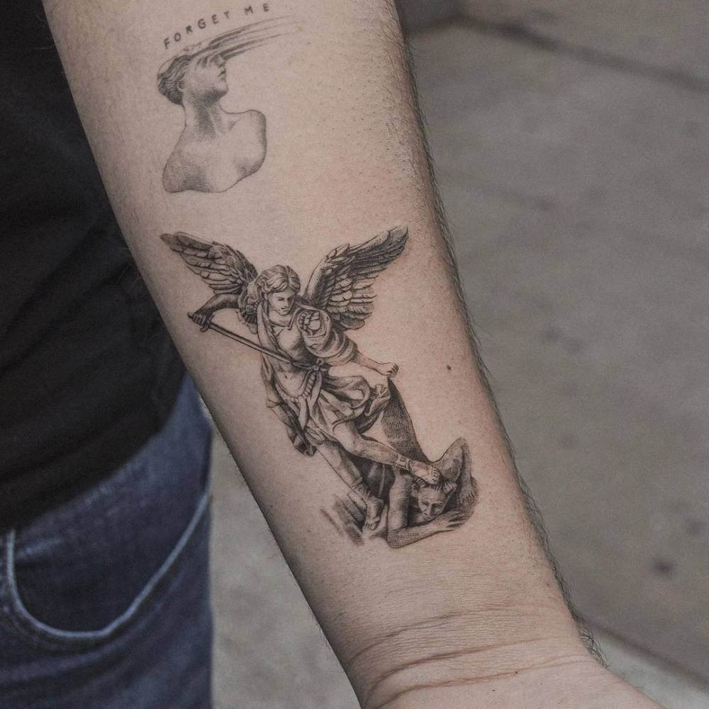 small saint michael tattoo